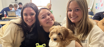 Adams Farm forever family with their puppy